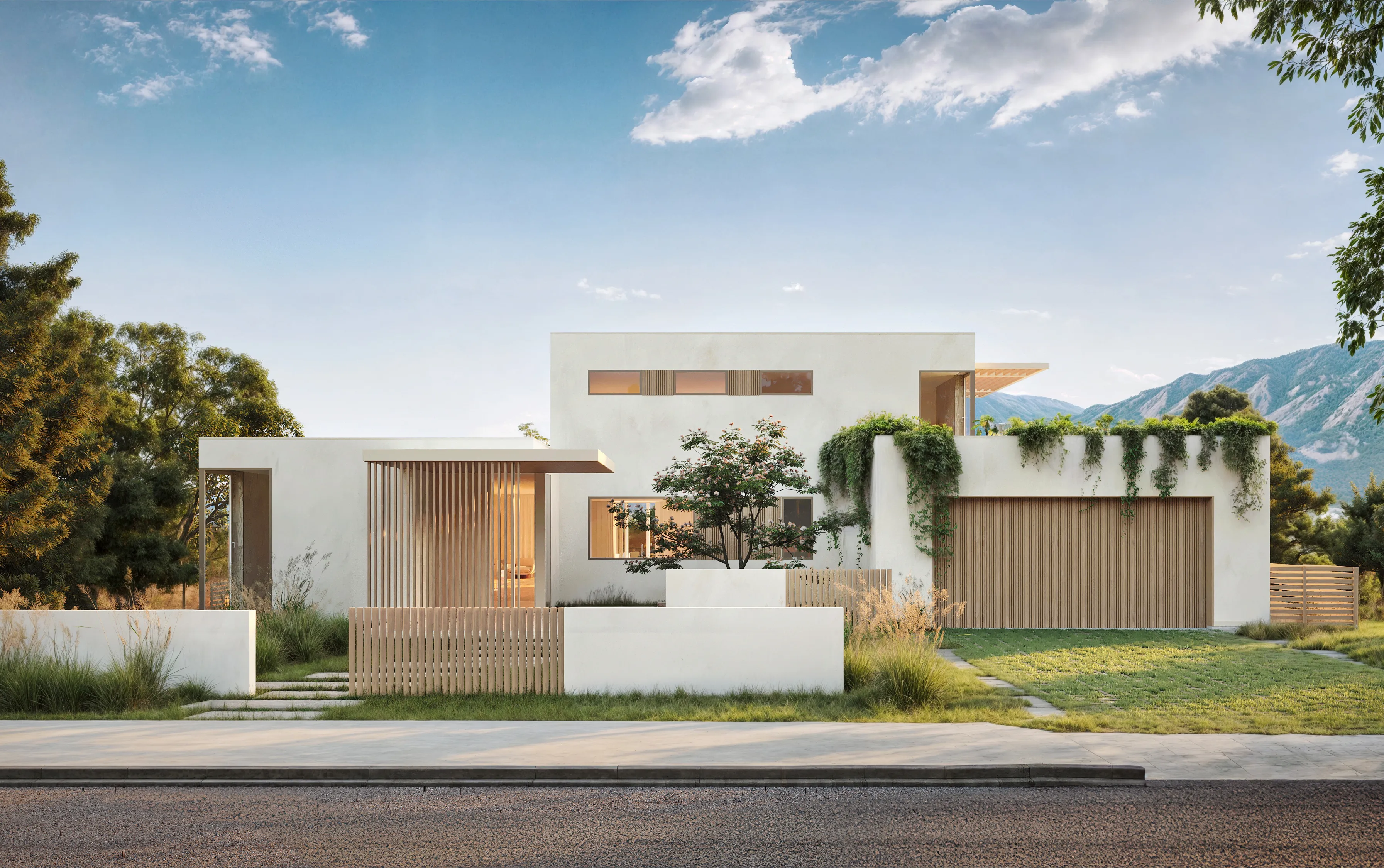 A front view of a modernist house, with small windows and mountains in the background.